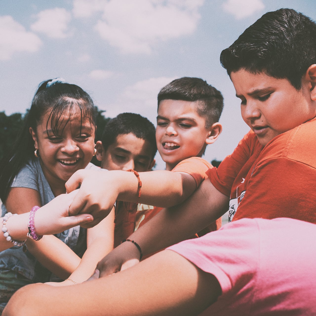image of children holding hands.